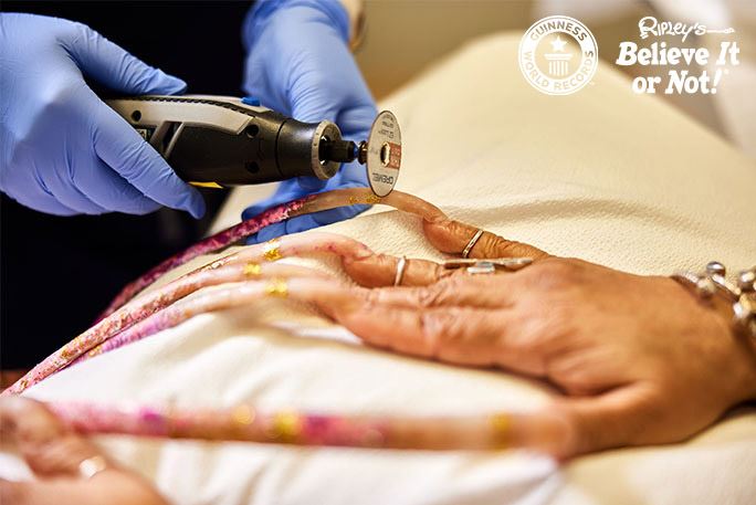 world’s longest nails holder finally gets fingernails cut after 30 years