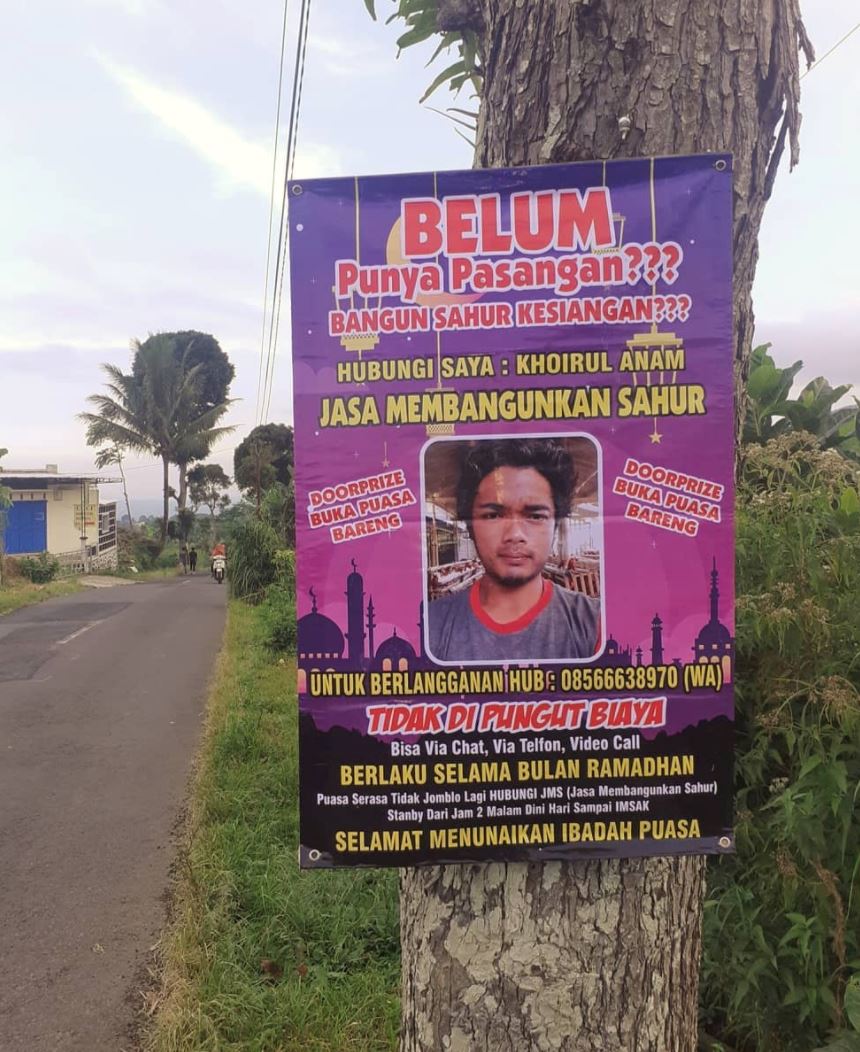 indonesian man offers service to wake you up in time for sahur during ramadan month