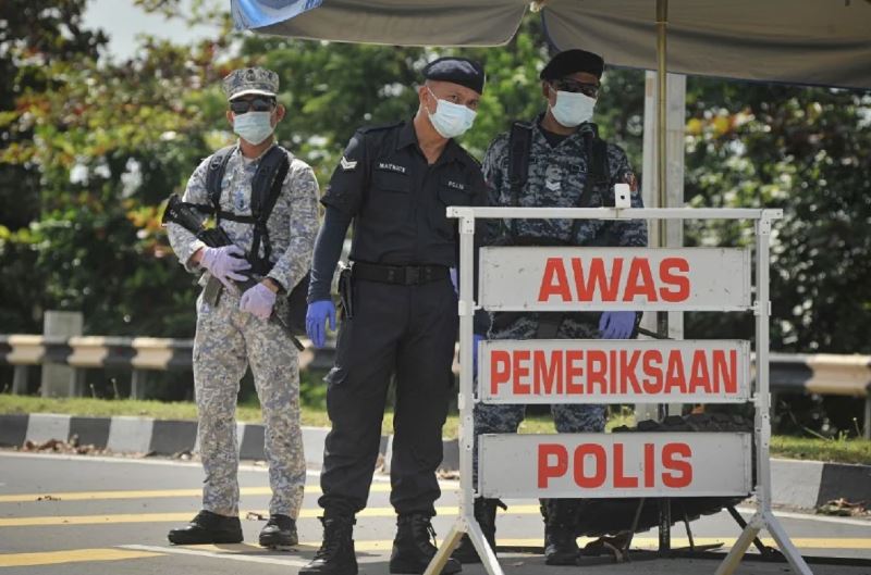 man arrested by police for possessing 15 fake interstate travel permits