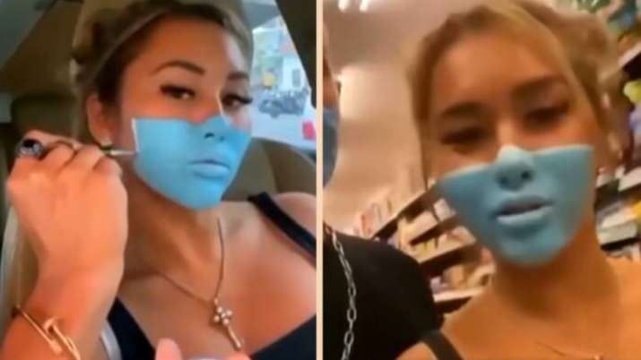 couple face deportation from bali for reaction video with painted on face mask