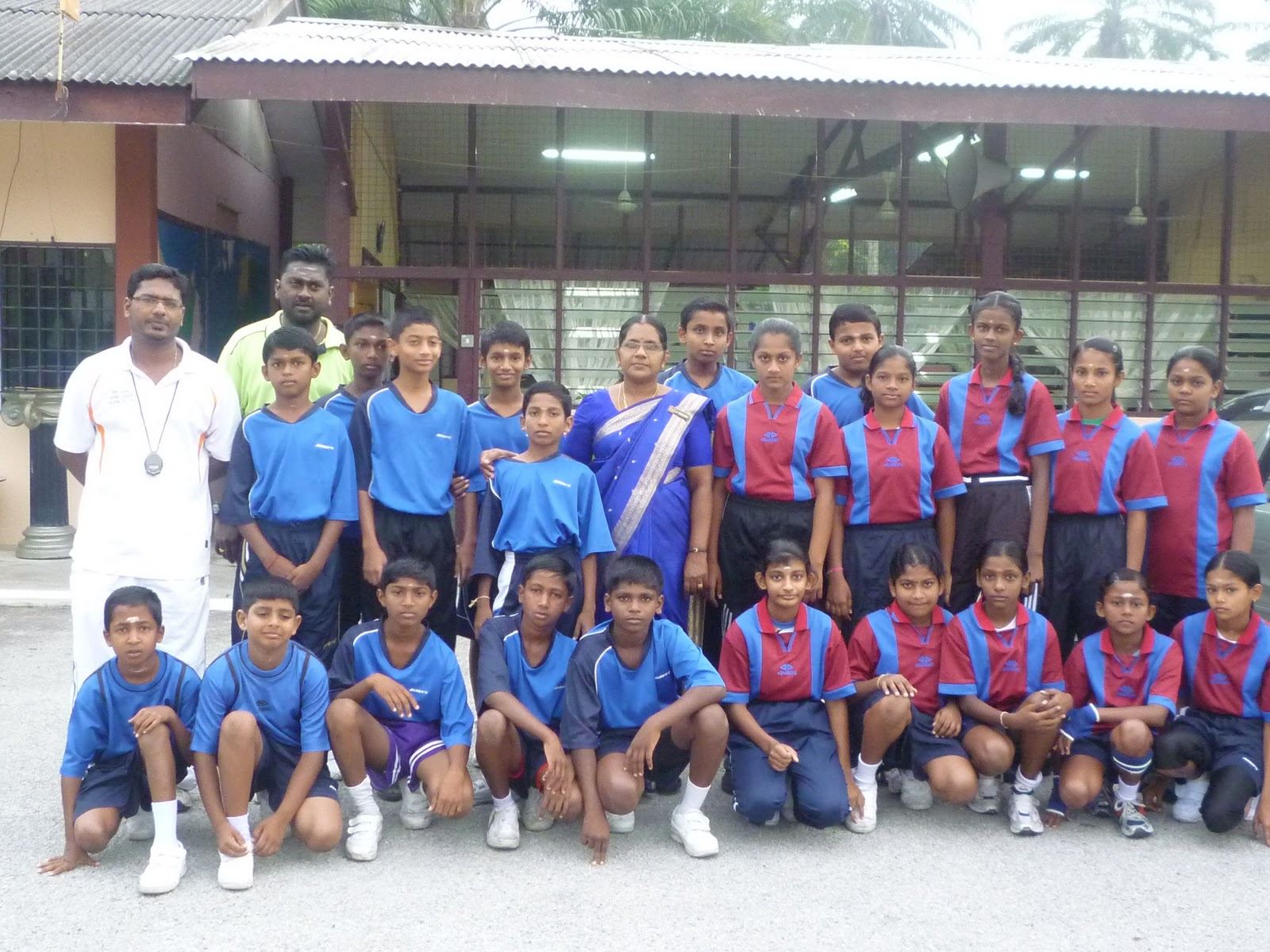 Science teacher with primary school students