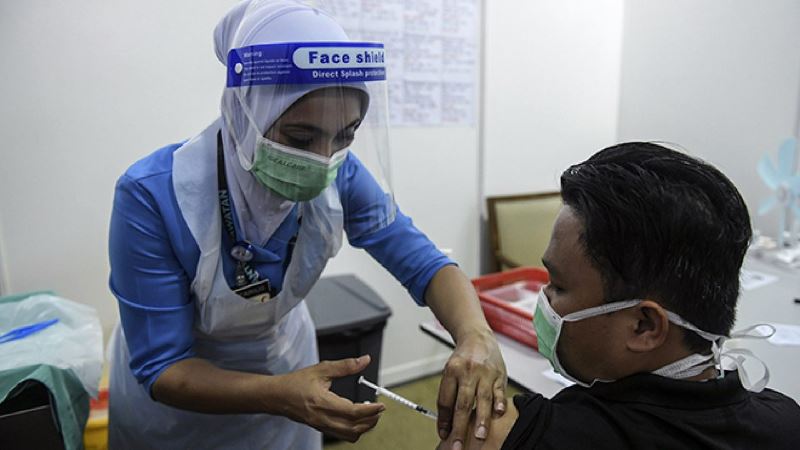 almost 60% of adults in malaysia fully vaccinated