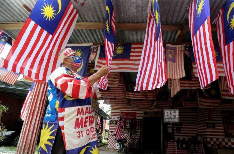 army veteran collects and decorates his home with old jalur gemilang flags to show his patriotism th
