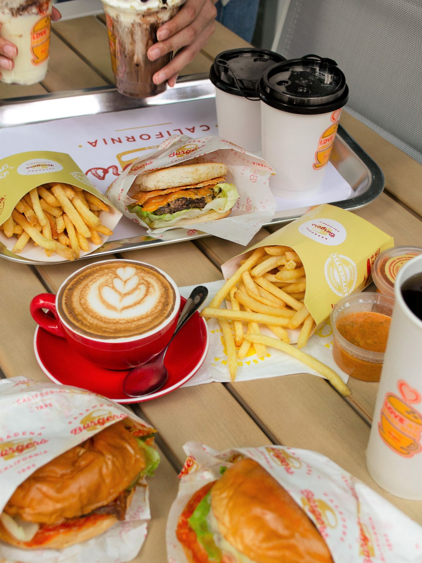 malaysia’s first cheese dipping burger launches first hybrid outlet concept!