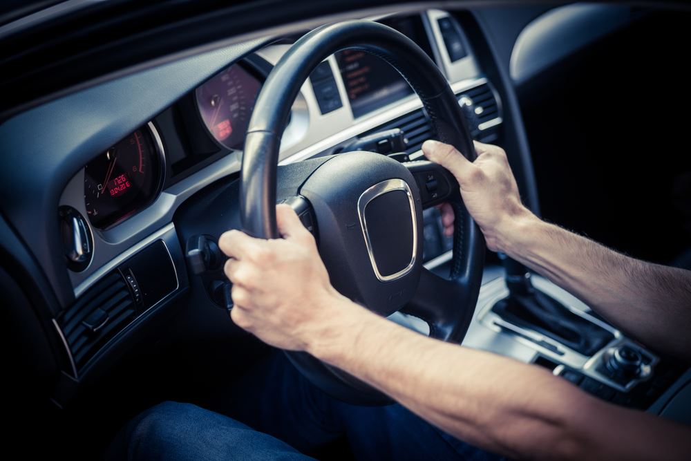Grip steering wheel good driving posture