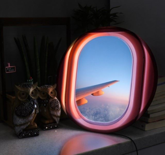 company creates airplane window lamp for people who miss travelling