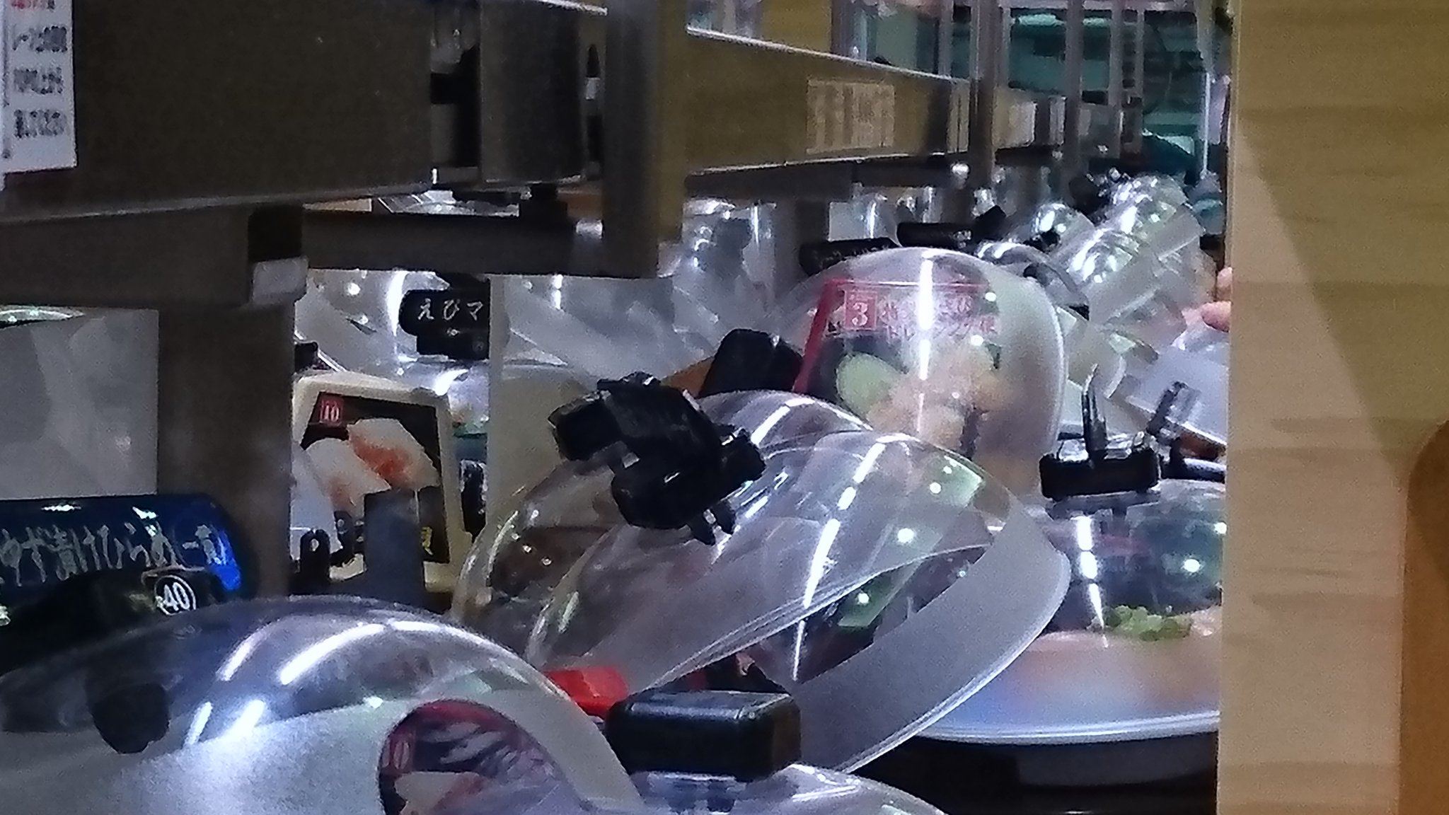 kid derails sushi plates and causes conveyor belt chaos in japan