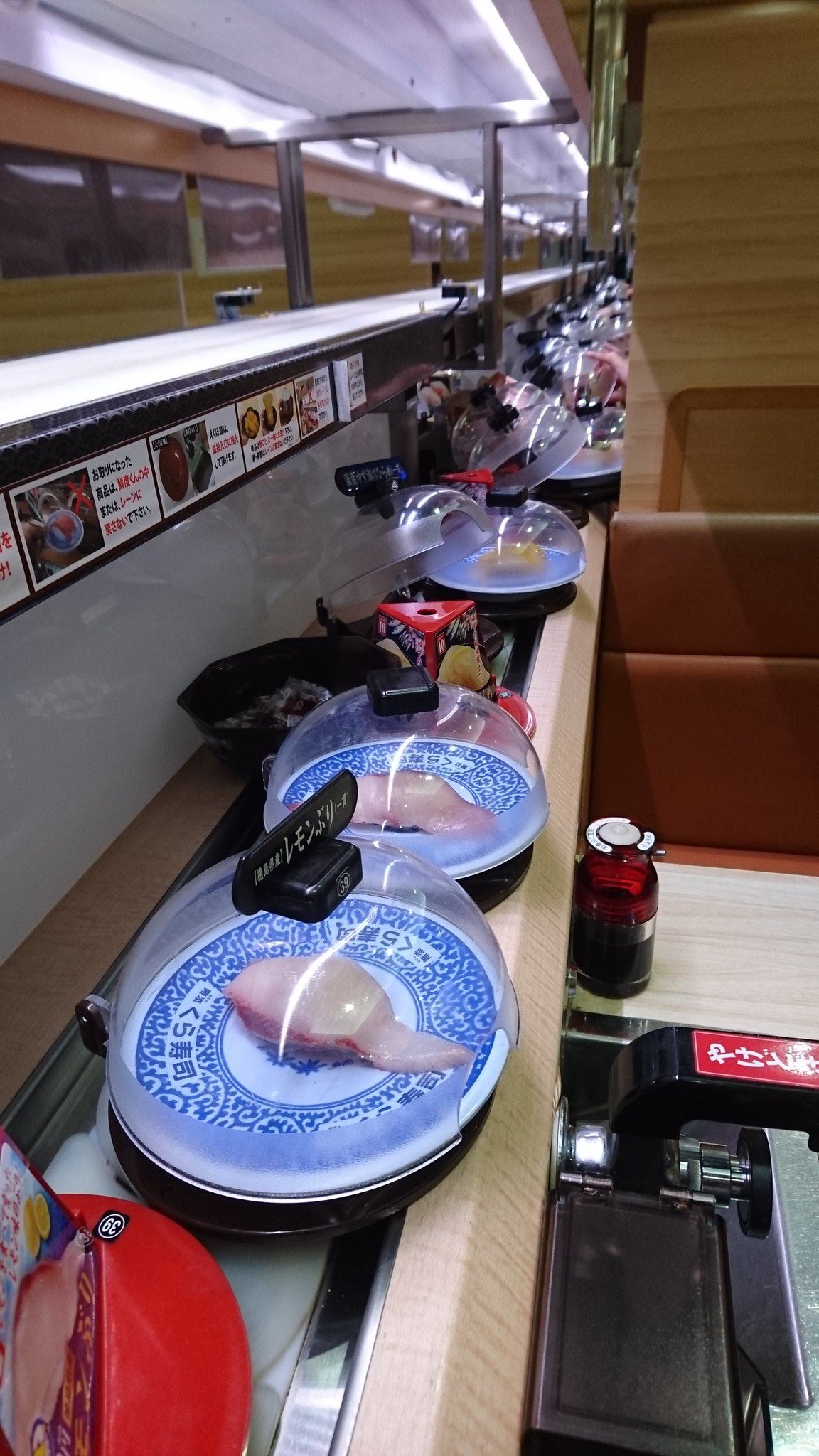 kid derails sushi plates and causes conveyor belt chaos in japan