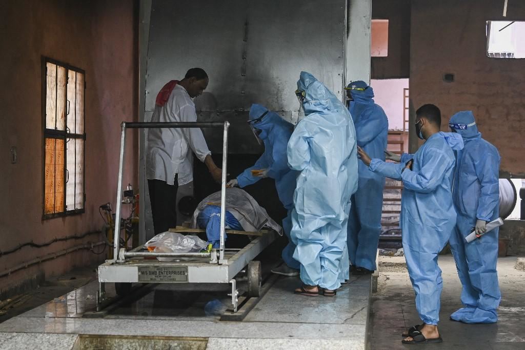 criminals discusies in ppe & cremates murder victim as a covid-19 death!