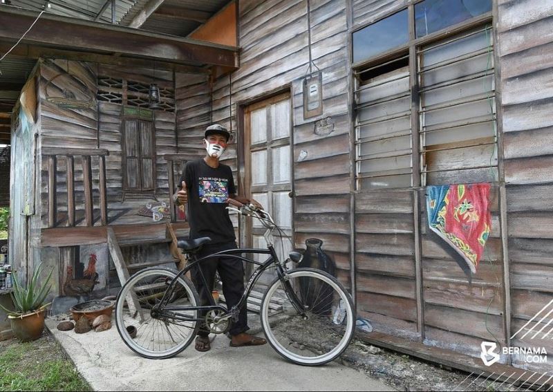 talented artist from terengganu turns his workshop’s wall into a work of art!