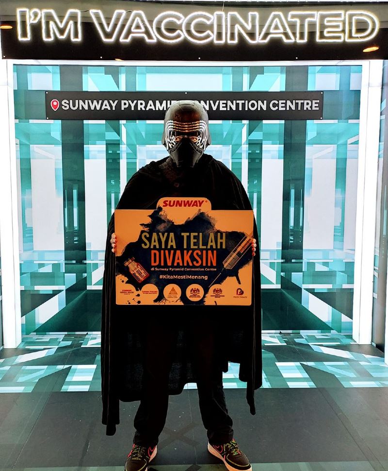 malaysians dress up in cool costumes to get their covid-19 vaccines!