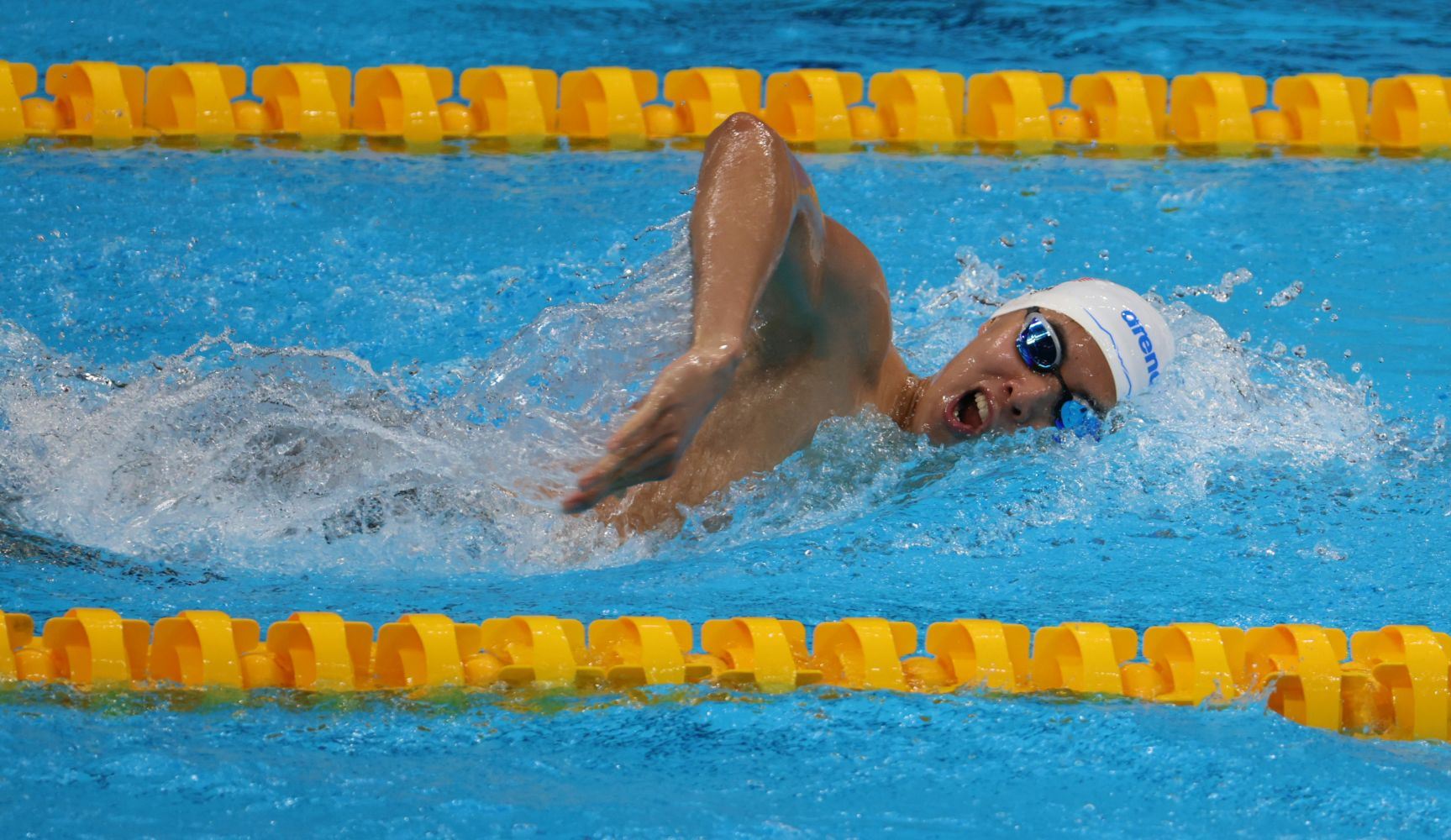 malaysian swimmer welson sim goes viral in china for his “sunshine” look