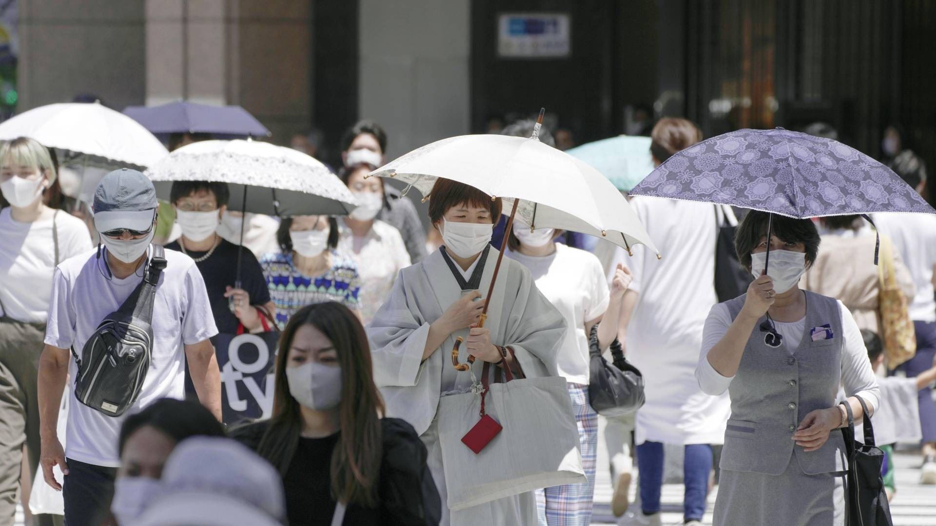 covid-19 cases in japan reach a new daily high with 9,000 cases.