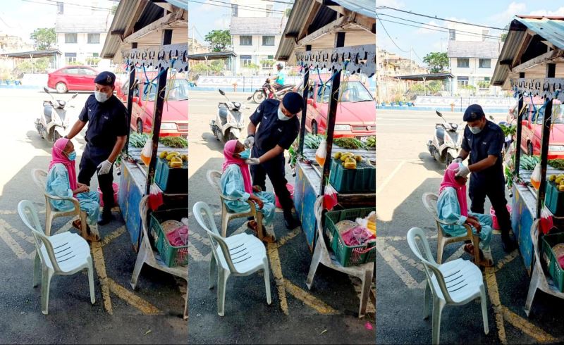 netizens praise abang polis for helping a mak cik put on a face mask and not summoning her!