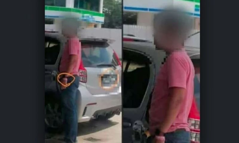 man with pink wristband, no face mask spotted at a petrol station in bentong