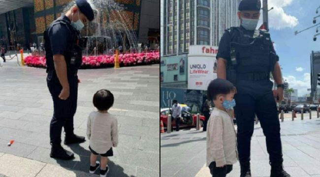 these photos of an ‘abang polis’ shielding a small boy from the sun are too cute!