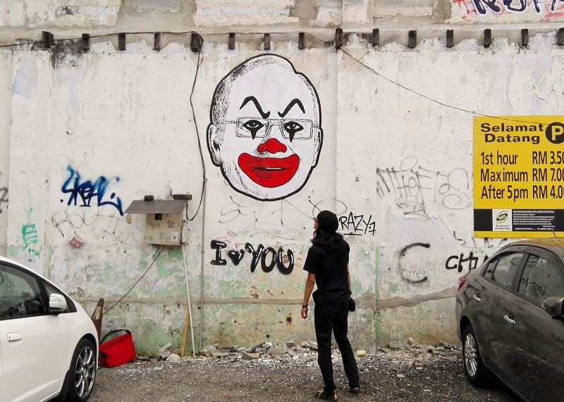 graphic designer fahmi reza under probe for alleged defamation against health minister