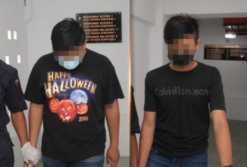 two students charged for wearing shirts with obscenities directed at their teacher