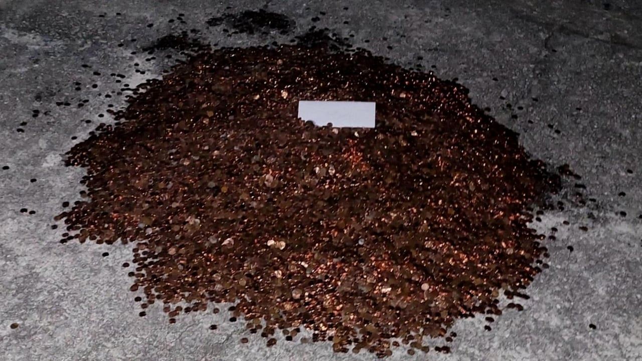 ‘childish’ company pays employee’s last check in coins covered in grease