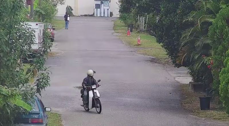 kelantan police are looking for a man caught on cctv harassing a young girl