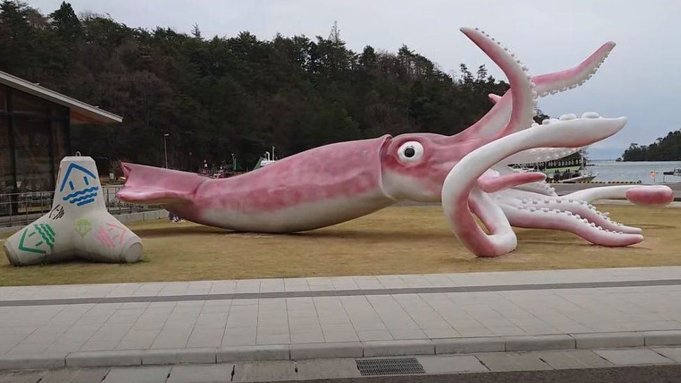 japanese town builds giant squid statue with covid relief fund to attract tourists 