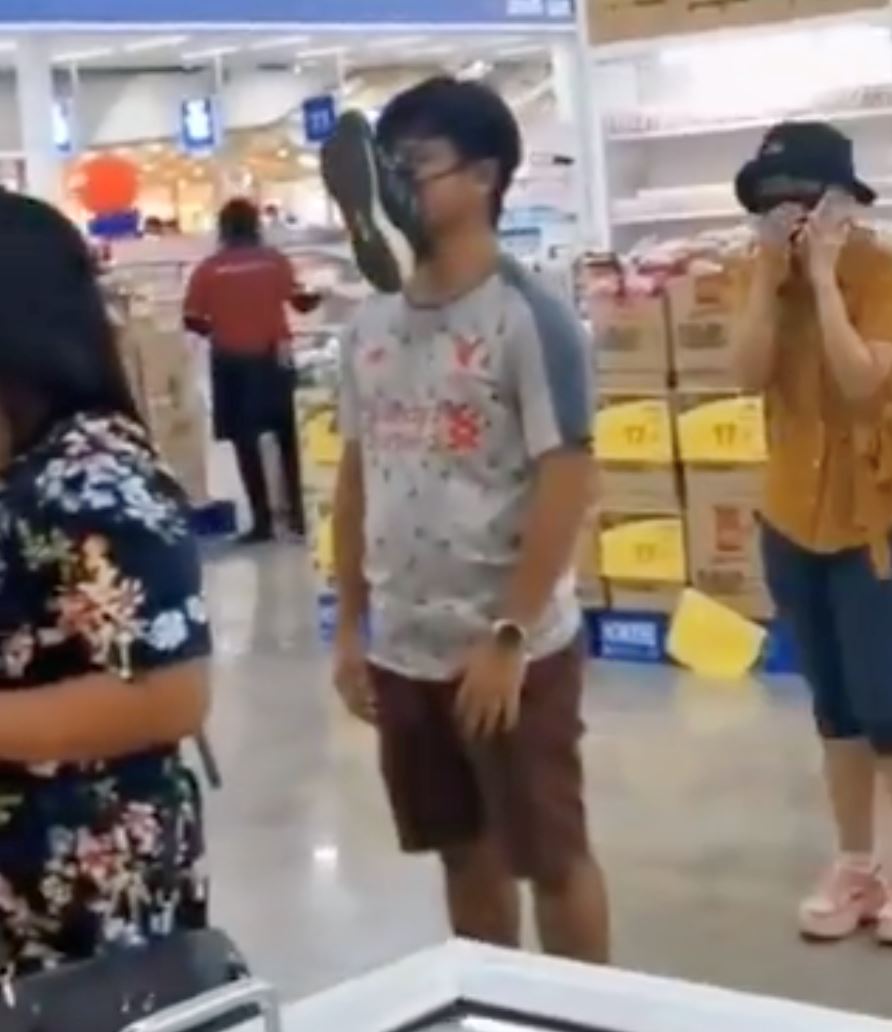 taiwanese man forgets his face mask and ties shoe on his face instead 