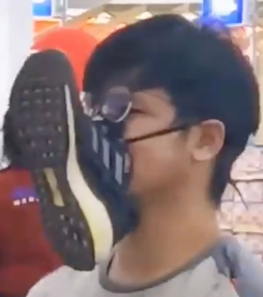 taiwanese man forgets his face mask and ties shoe on his face instead 