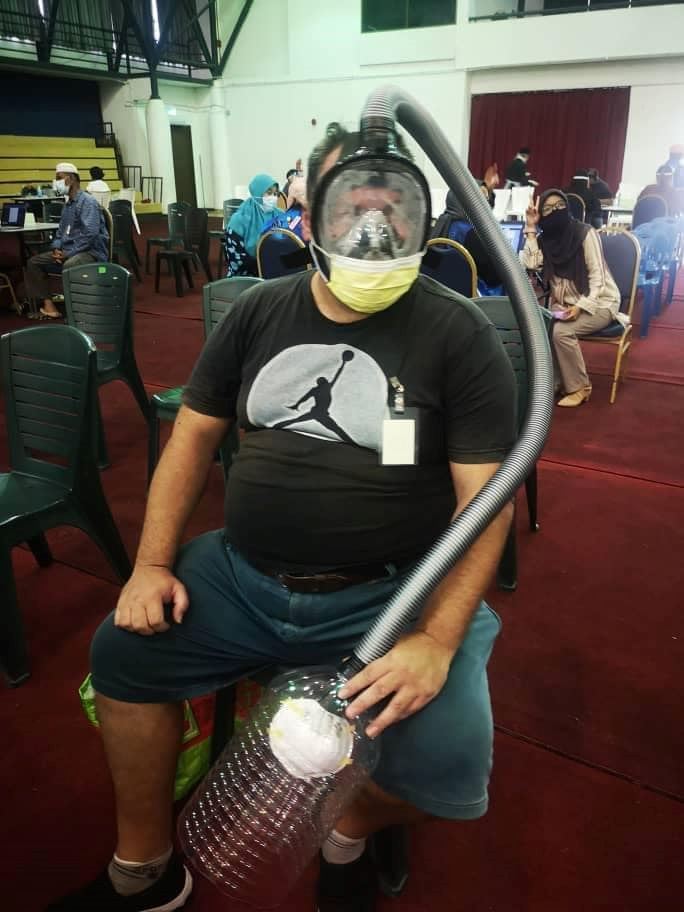 foreigner in msia goes viral after wearing diy mask to get vaccine