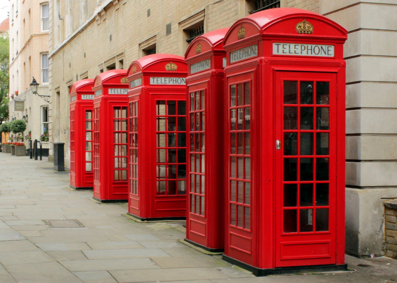 thousands of uk iconic red telephone boxes to be protected from closure