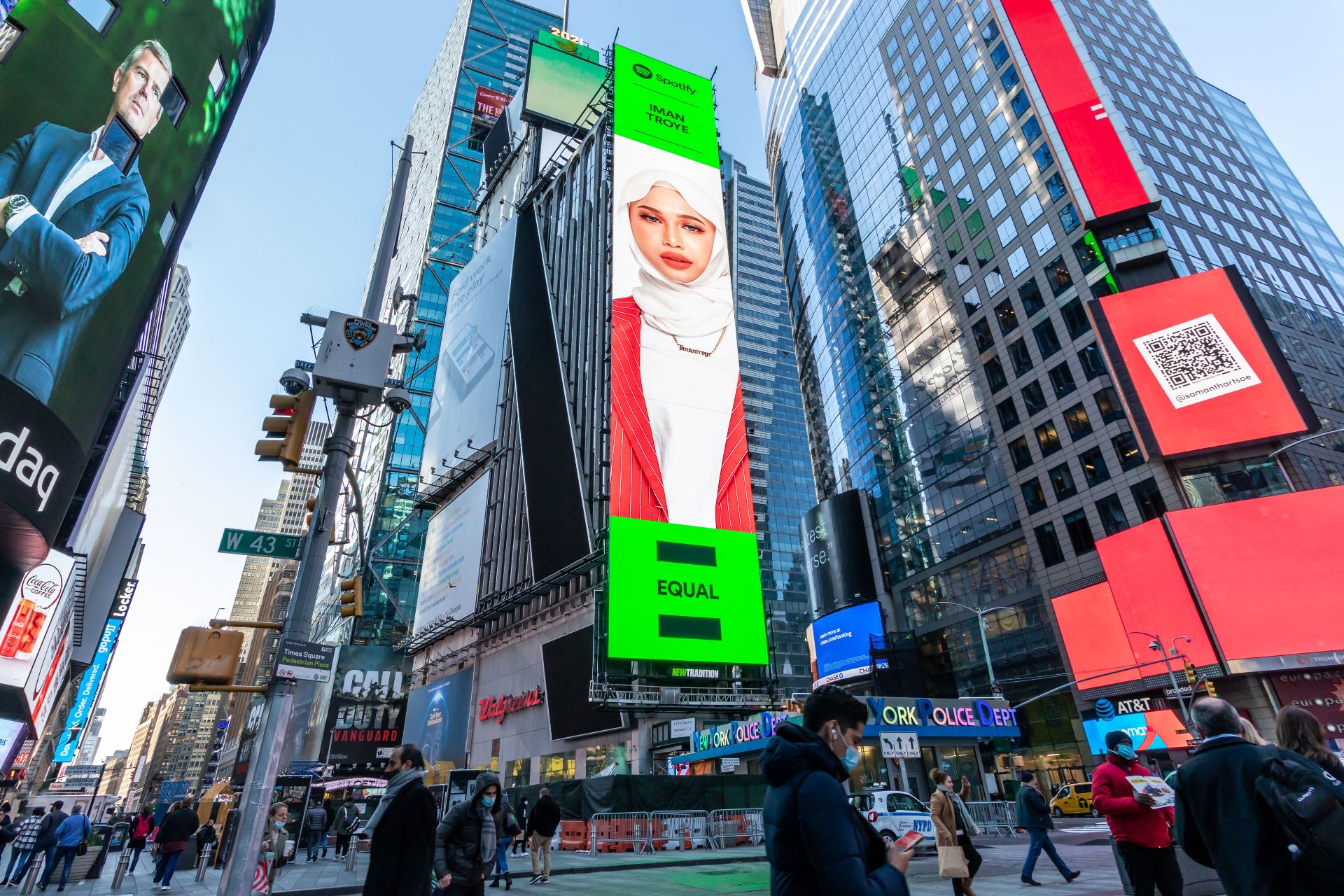 iman troye represents malaysia as equal artist of the month on new york times square billboard!