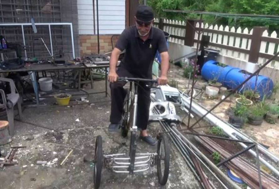  disbaled man from terengganu builds disabled-friendly bicycle out of recycled materials for himself