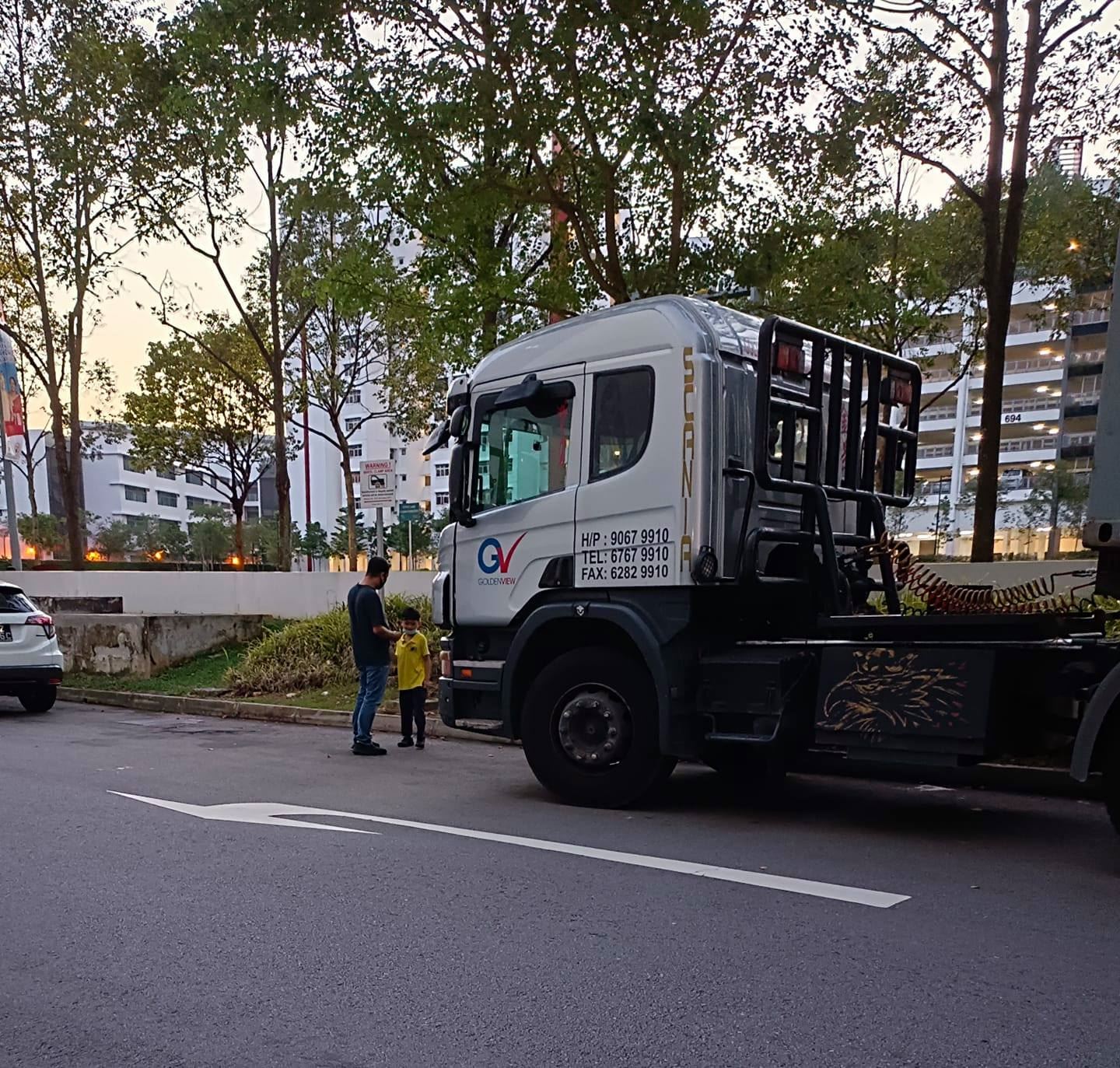 s’pore man lets autistic boy ride his truck, in awe of father’s patience raising him
