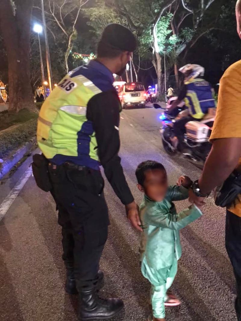pdrm officers fulfill young boy’s wish to sit on patrol motorcycle