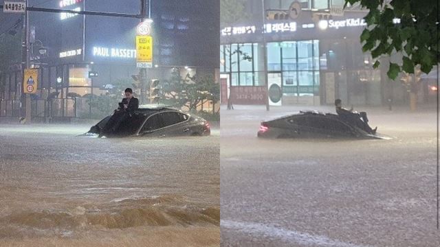 banjir terburuk landa seoul, pemuda ini terlihat 'santai' duduk di atas kereta yang hampir tenggelam
