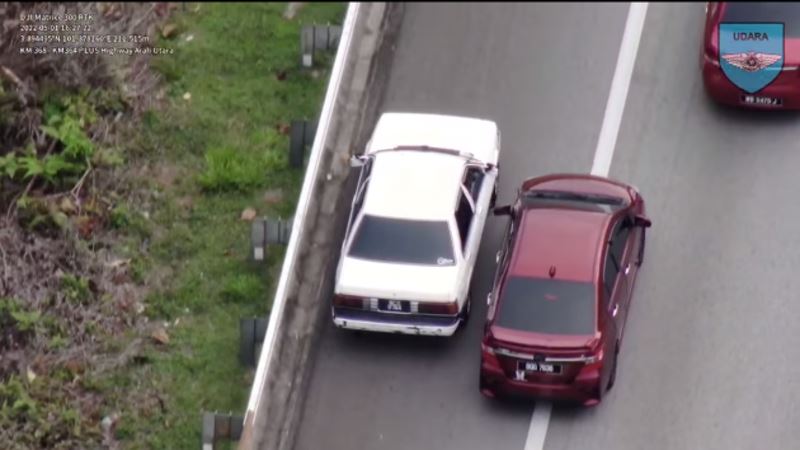 accident while illegally driving in the emergency lane - who is at fault?