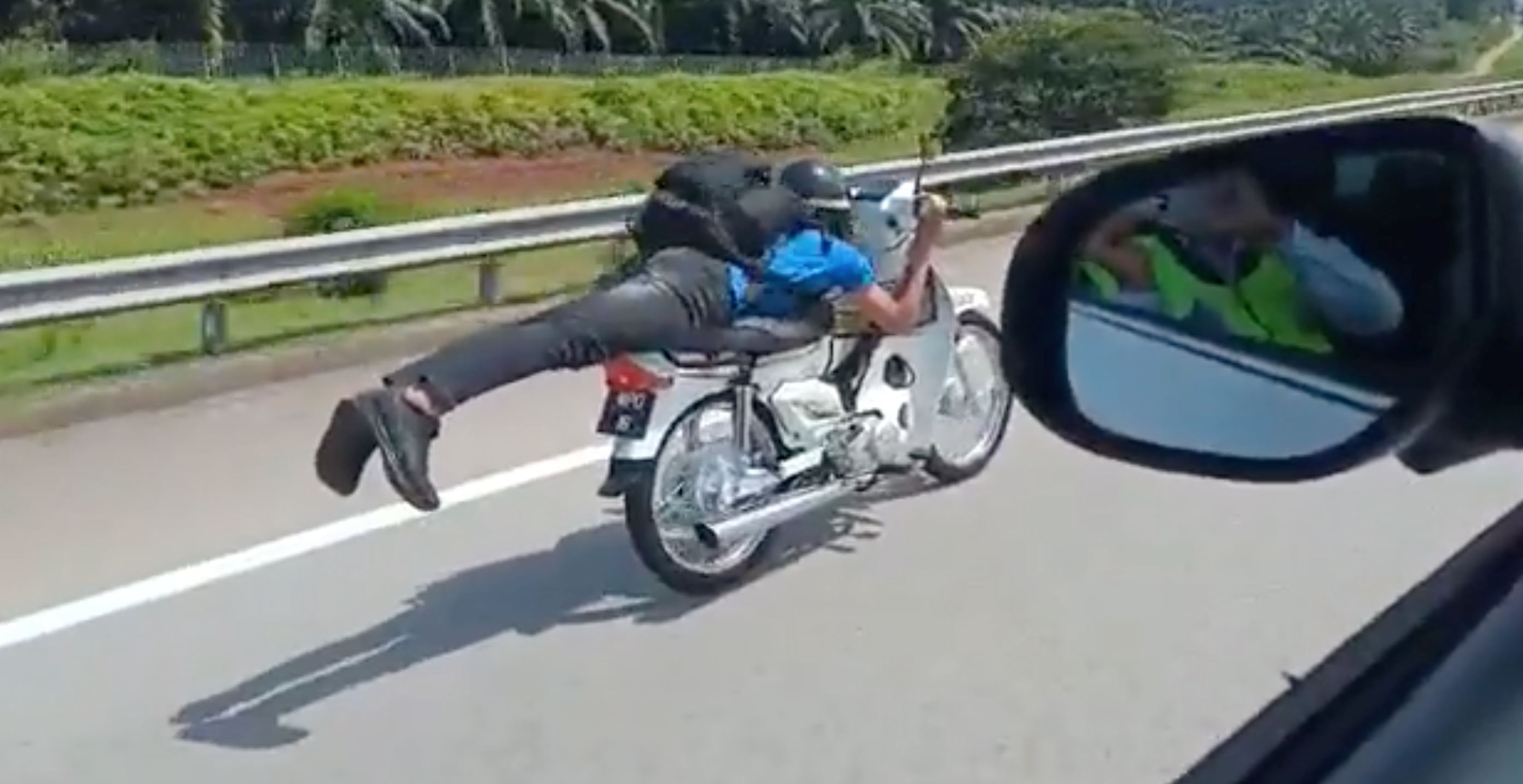 m’sian does “superman” stunt on his motorcycle chased by police, later crashed and arrested