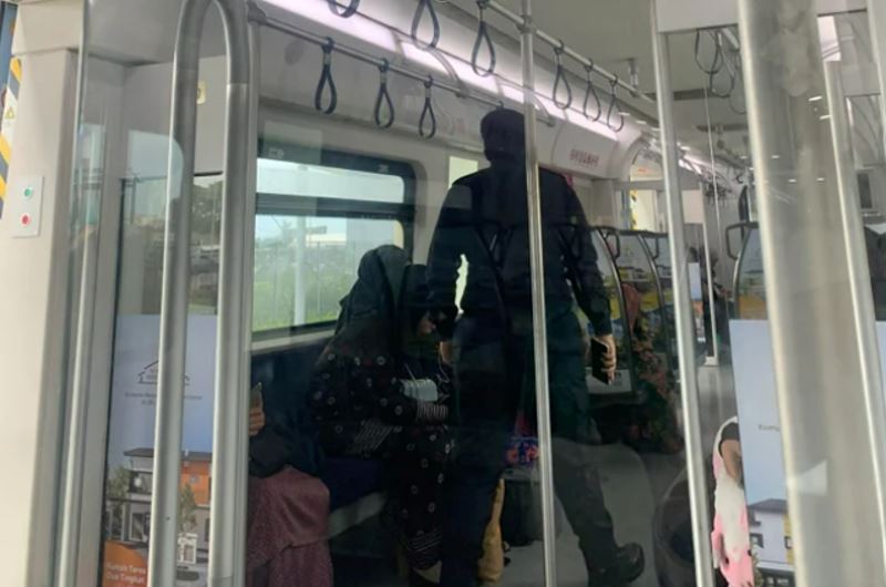 a photo went viral of three men sitting in women’s ktm coach, sparks online debate