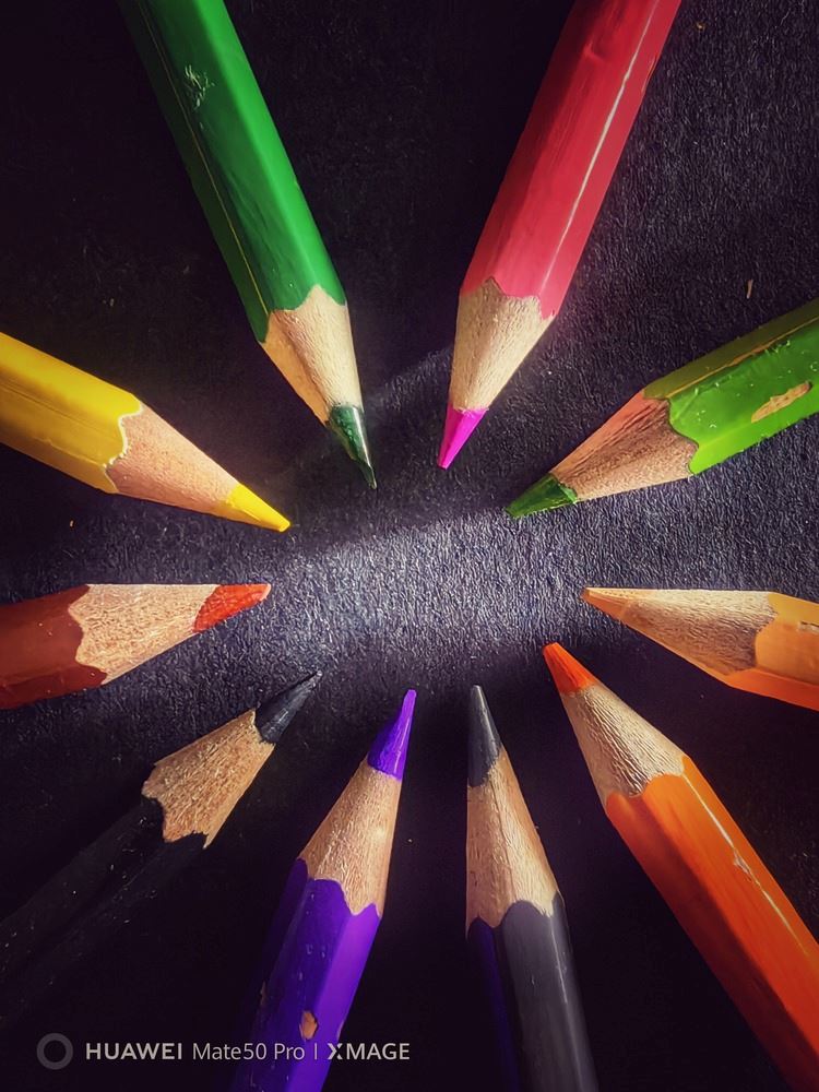 Colour pencils arranged in a circle