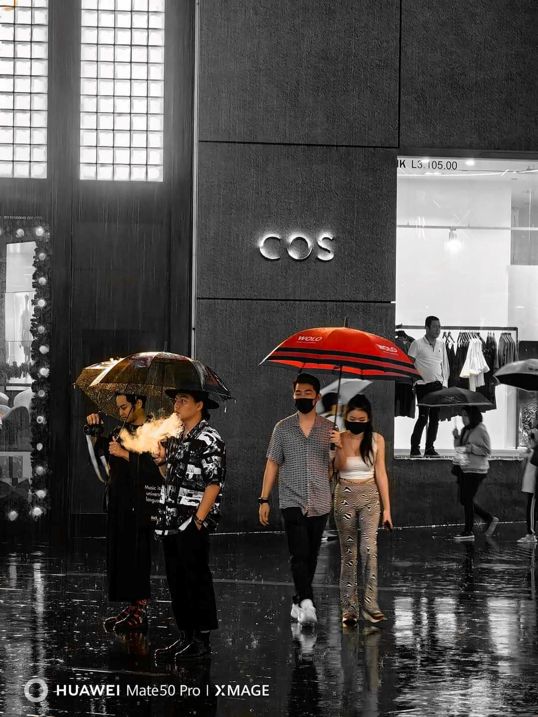 Shoppers on a rainy day at Pavilion KL