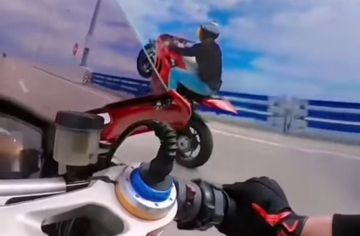 police identifying motorcycle riders behind wheelie stunt on penang bridge