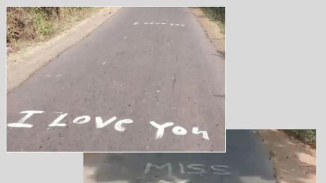 lelaki coret 'i love you' di atas laluan jalan raya