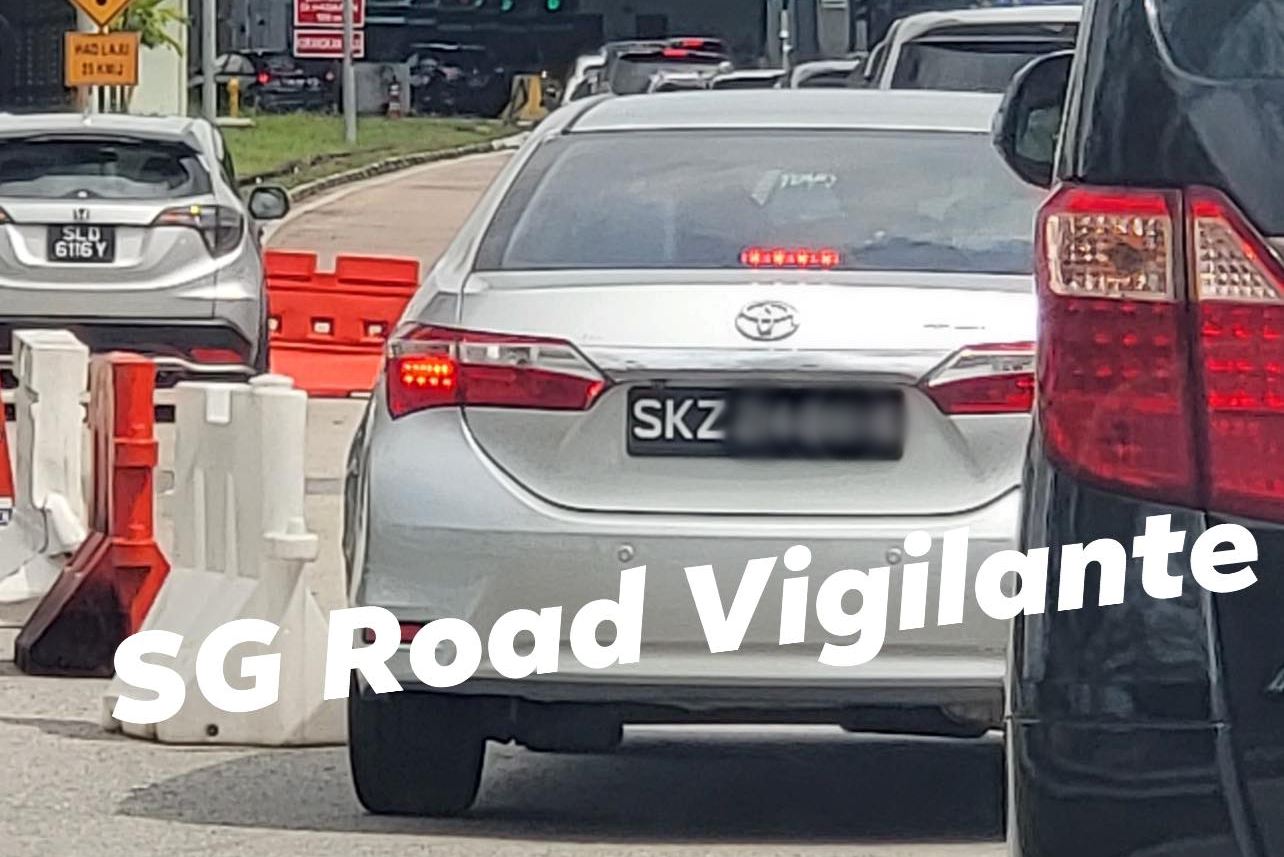 m’sian police looking for two men in s’pore car peeing under tree in johor