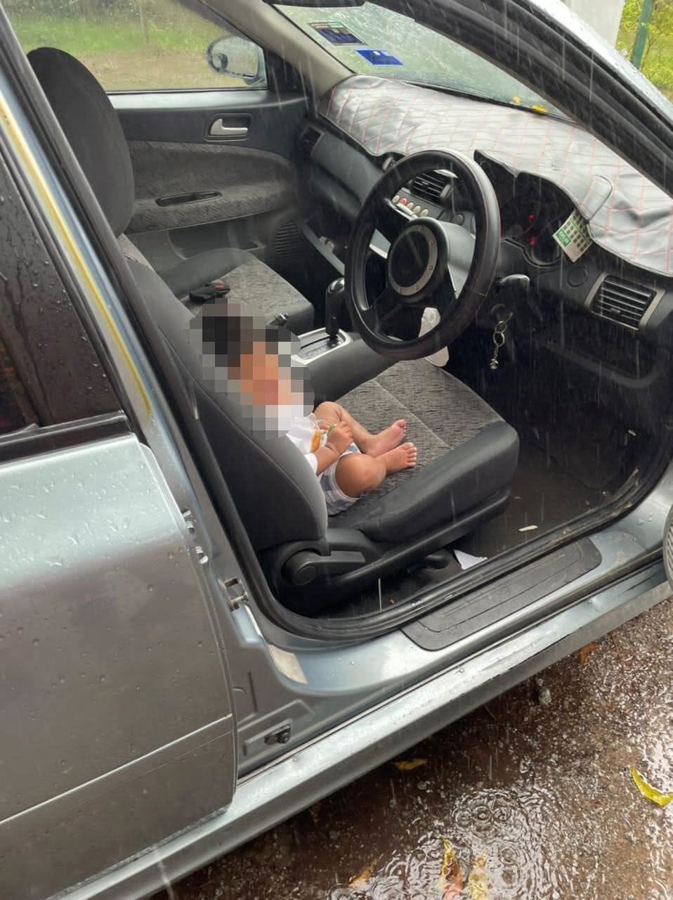 bomba in melaka forces car door open to rescue toddler sitting alone in passenger seat!