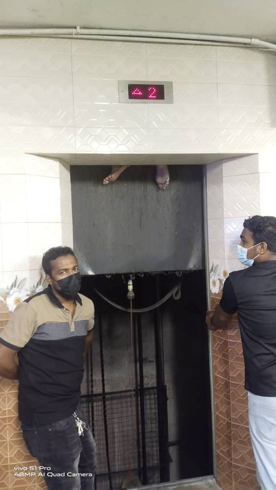 man in penang got his feet stuck between elevator doors, video went viral online