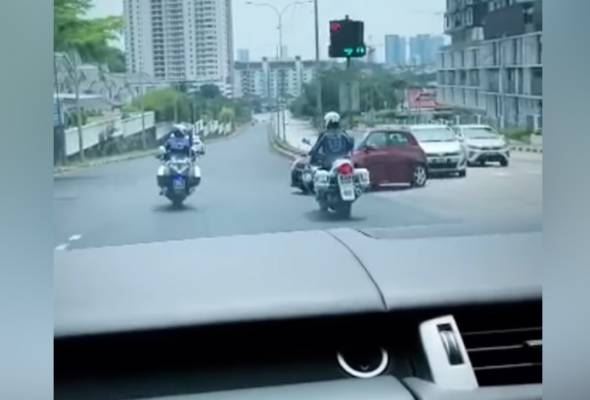 netizen berang tindakan pemandu kereta diiringi polis trafik untuk elak jalan raya sesak