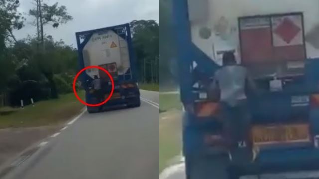 lelaki buat kerja tak masuk akal, berpaut di belakang lori 