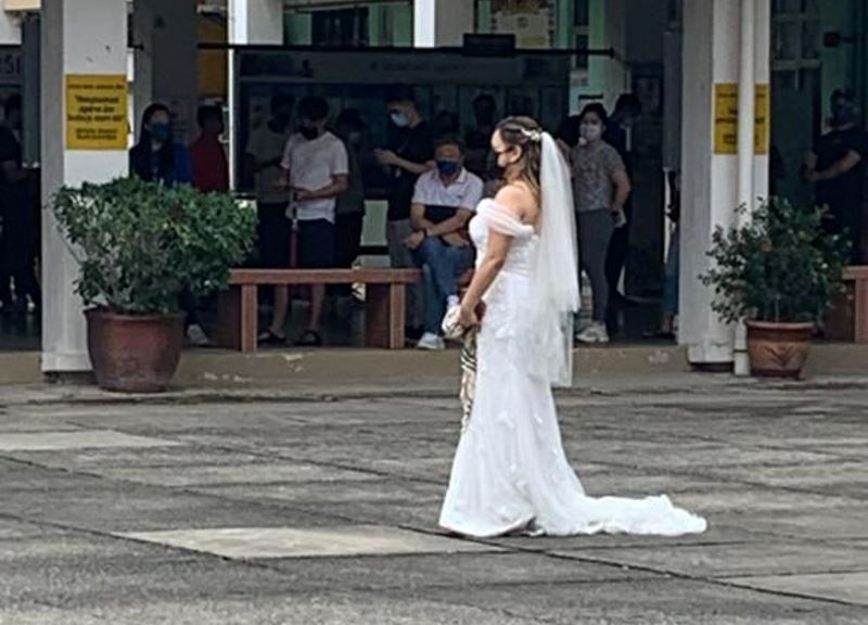#ge15: m’sian newlyweds praised for voting in their wedding attire on their ‘special day’