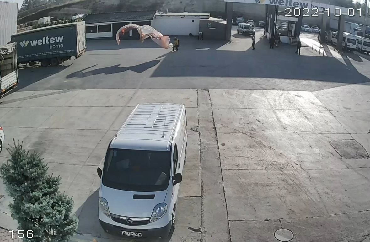 turkish paragliding enthusiast, adam keskin makes it to work in time by paragliding