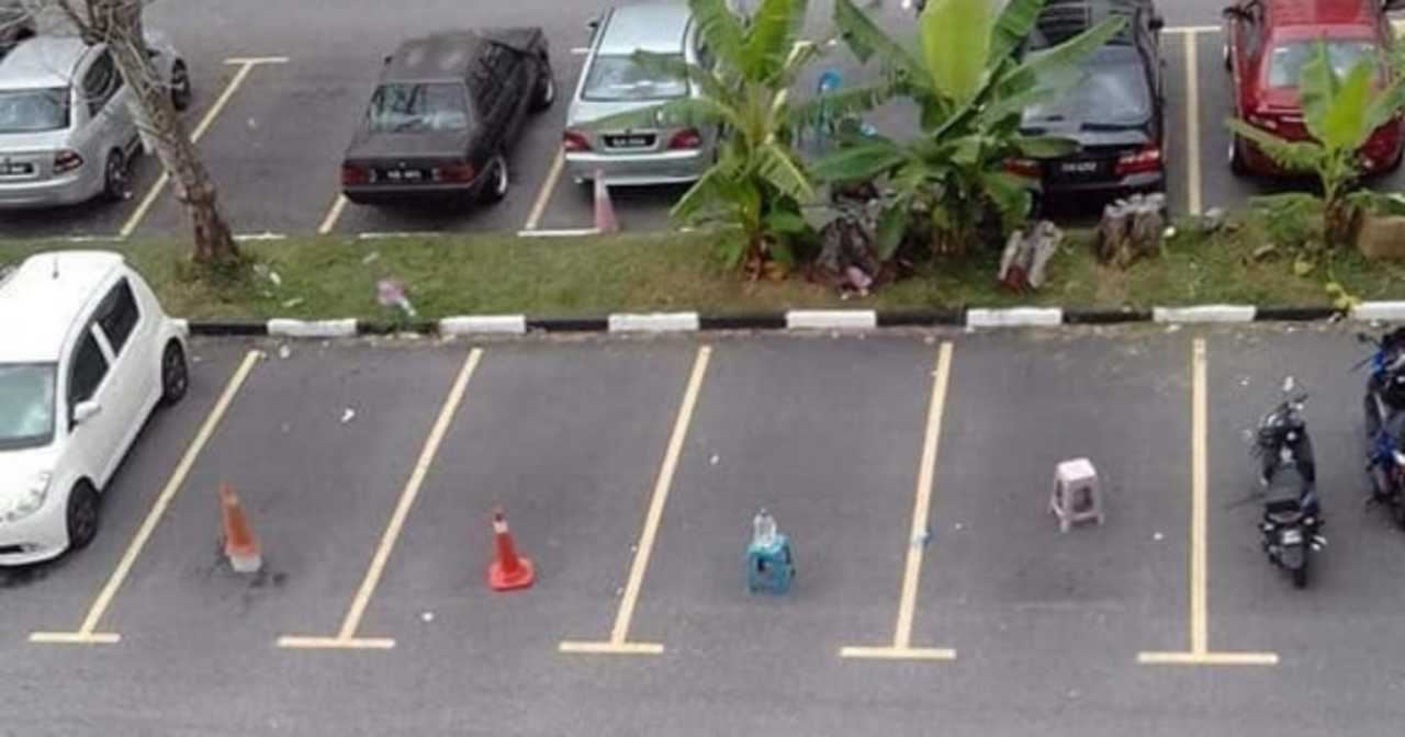 awas, letak ampaian pada petak parking boleh kena denda dan penjara! 