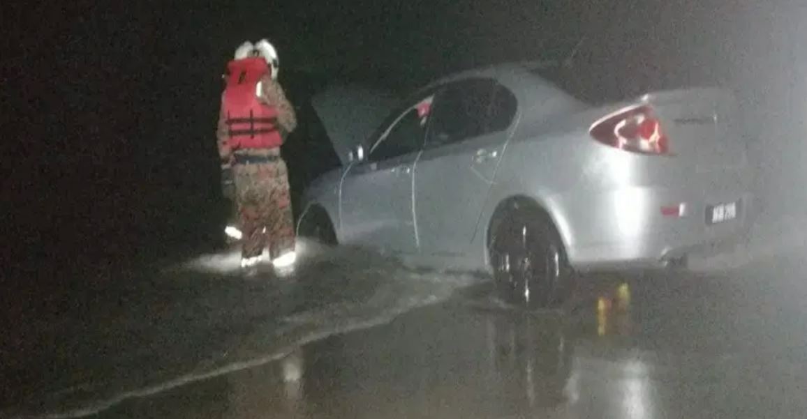 perak man drowns while attempting to stop his car from sliding into the sea